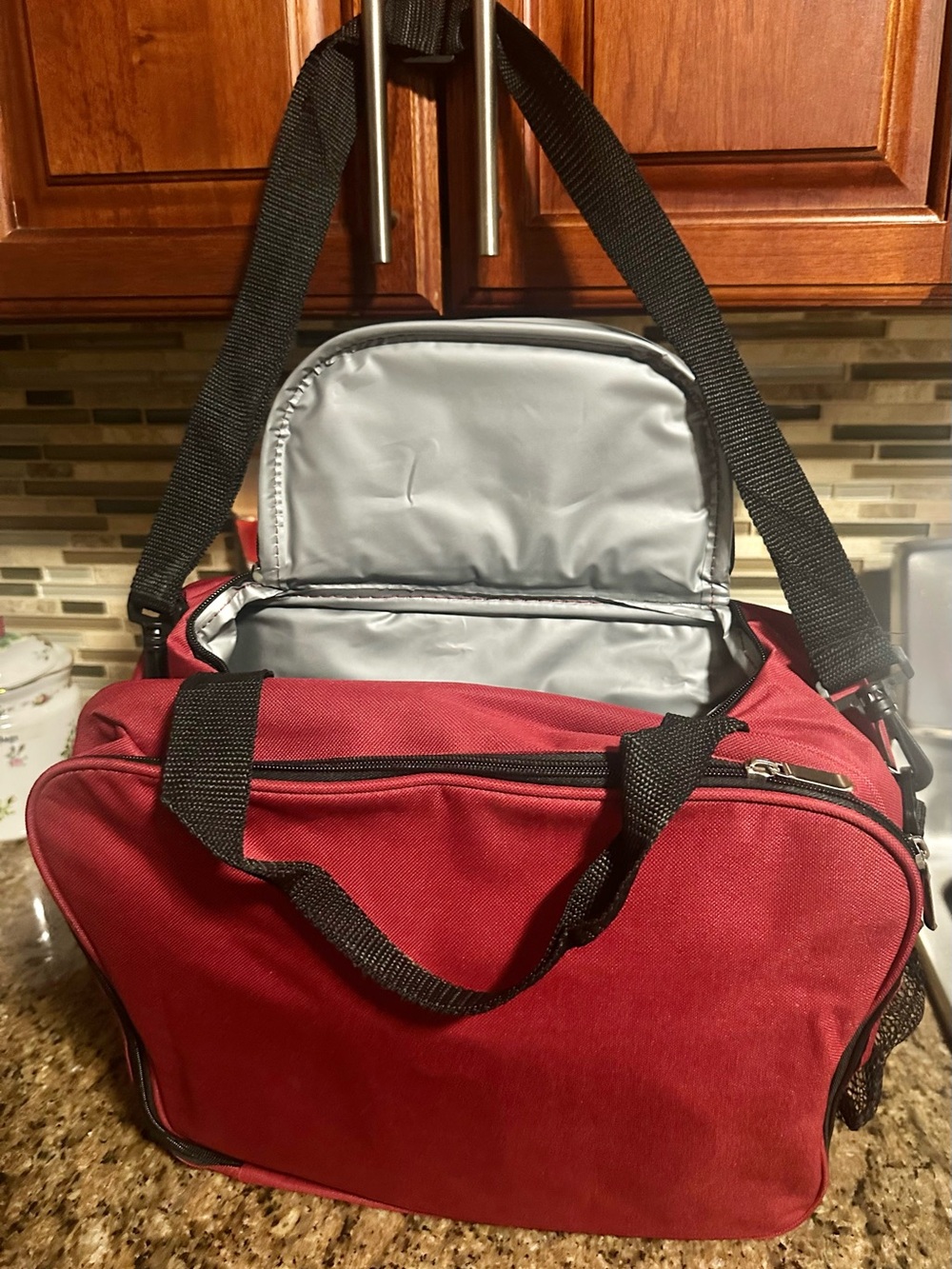 Red cooler Bag with Adjustable Strap and short Velcro handles with utensils